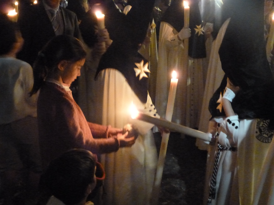 Collecting Wax From the Procession Candles in Sevilla